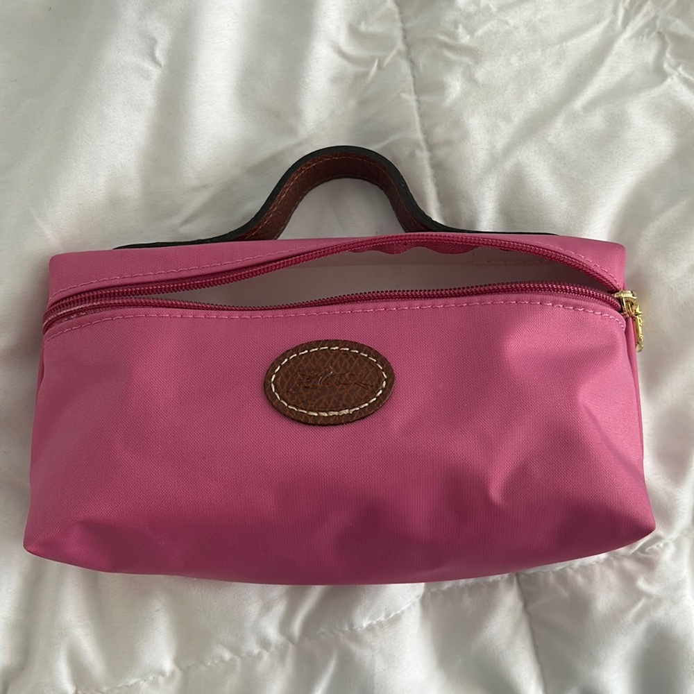Small pink Longchamp bag.